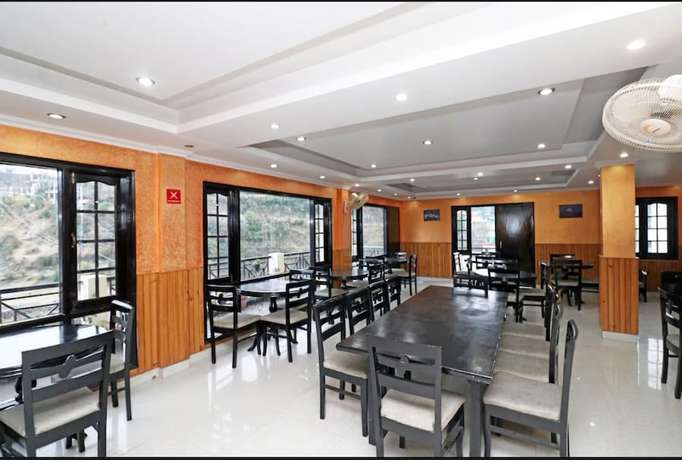 Imagen del bar/restaurante del Hotel Traveller Inn, Kumaon. Foto 5