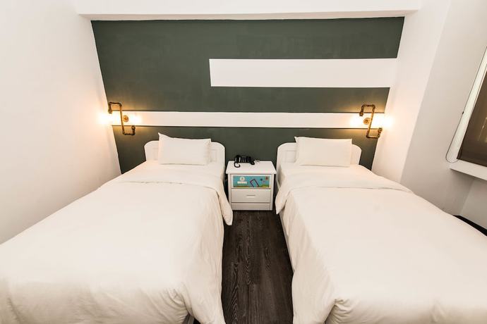 Imagen de la habitación del Hotel Traveller Inn Mido. Foto 2