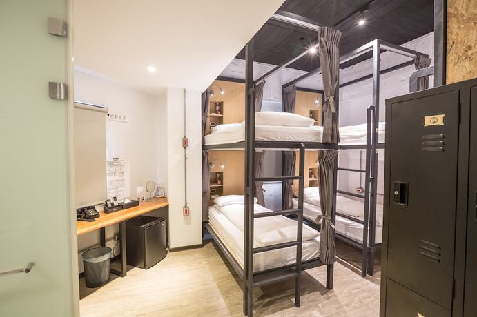 Imagen de la habitación del Hotel Traveller Inn Tiehua. Foto 2