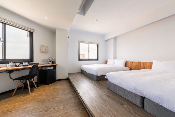 Imagen de la habitación del Hotel Traveller Inn Tiehua. Foto 4