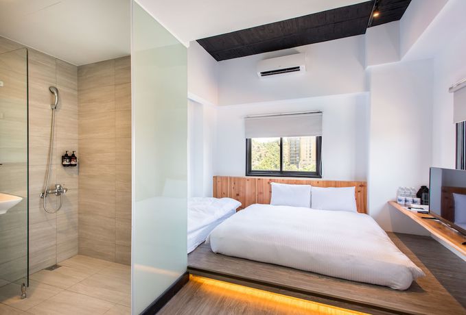 Imagen de la habitación del Hotel Traveller Inn Tiehua. Foto 6