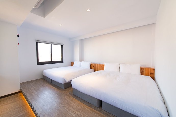 Imagen de la habitación del Hotel Traveller Inn Tiehua. Foto 14