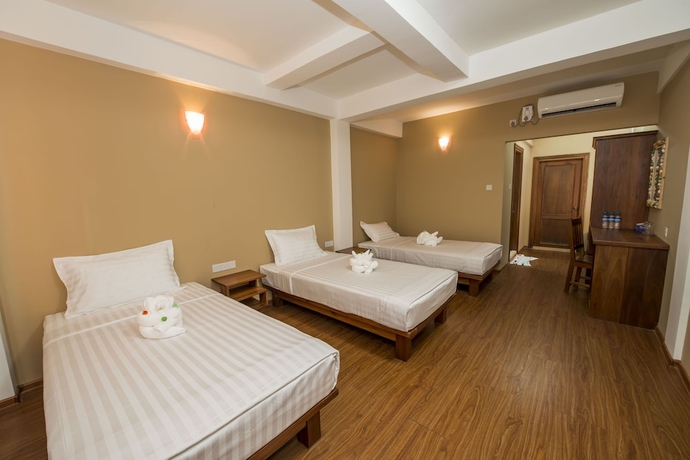 Imagen de la habitación del Hotel Traveller Lodge Ngapali by River Top - Hostel. Foto 2