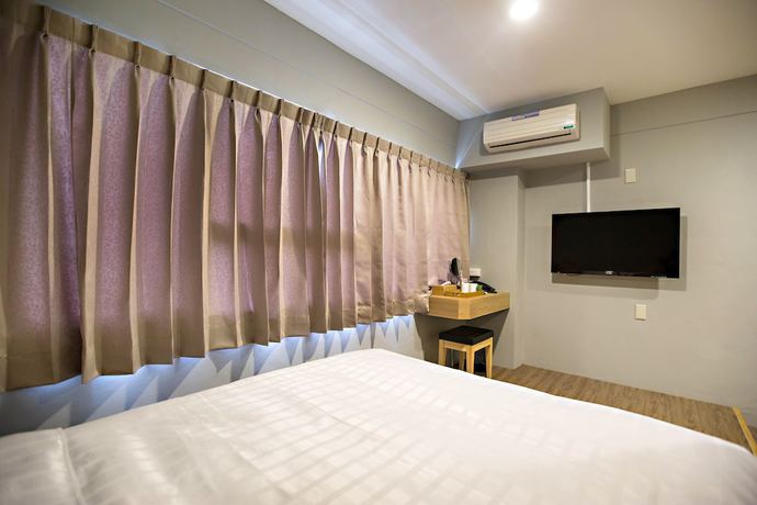 Imagen de la habitación del Hotel Traveller-inn Day Moon. Foto 3