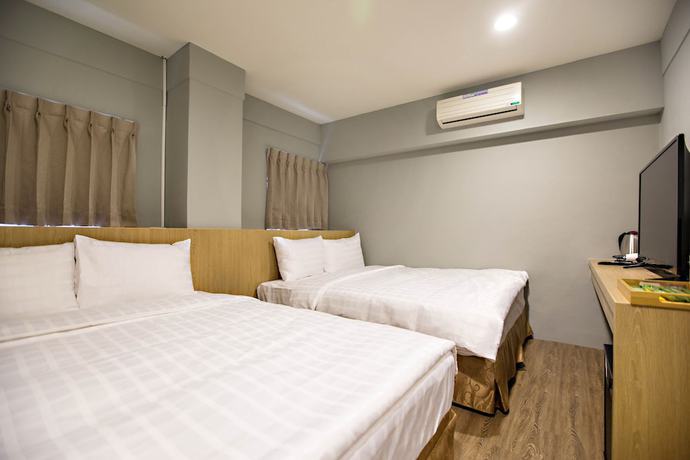 Imagen de la habitación del Hotel Traveller-inn Day Moon. Foto 8