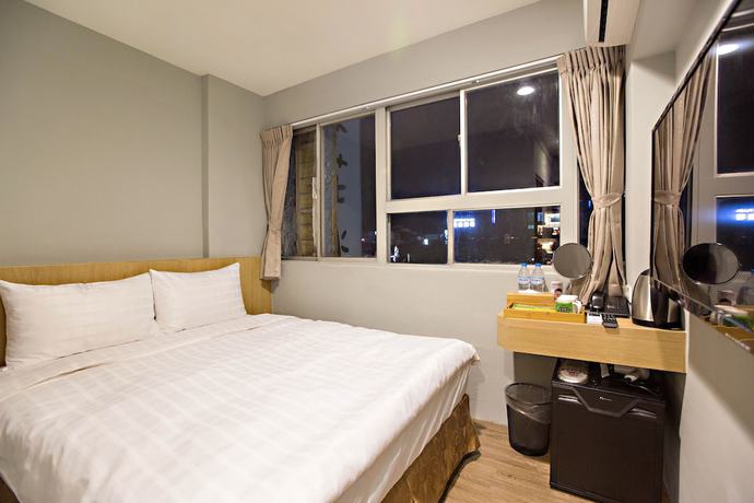 Imagen de la habitación del Hotel Traveller-inn Day Moon. Foto 11