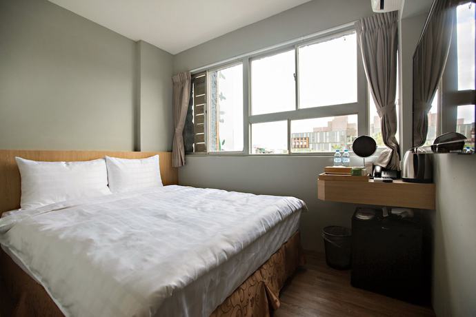 Imagen de la habitación del Hotel Traveller-inn Day Moon. Foto 16