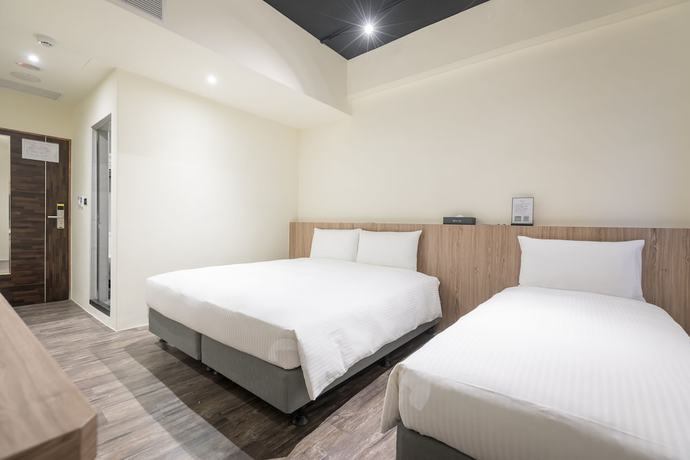 Imagen de la habitación del Hotel Traveller-inn Teihua Ii. Foto 2