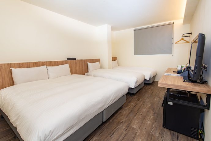 Imagen de la habitación del Hotel Traveller-inn Teihua Ii. Foto 3