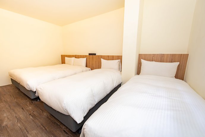 Imagen de la habitación del Hotel Traveller-inn Teihua Ii. Foto 5