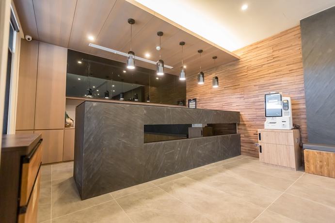 Imagen de los interiores del Hotel Traveller-inn Teihua Ii. Foto 14