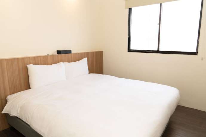 Imagen de la habitación del Hotel Traveller-inn Teihua Ii. Foto 6