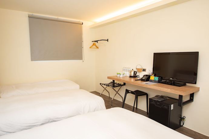 Imagen de la habitación del Hotel Traveller-inn Teihua Ii. Foto 7