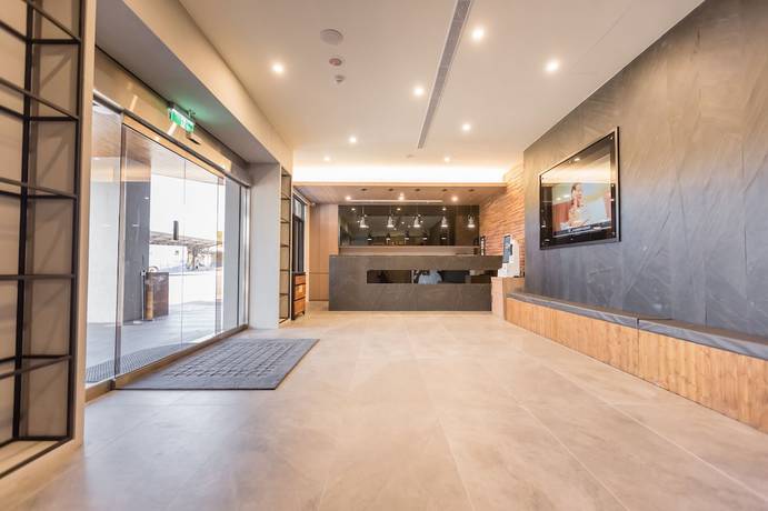 Imagen de los interiores del Hotel Traveller-inn Teihua Ii. Foto 16