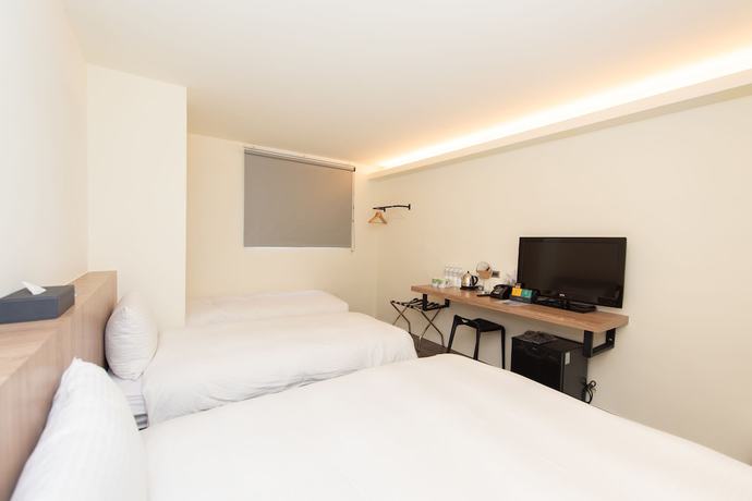 Imagen de la habitación del Hotel Traveller-inn Teihua Ii. Foto 8