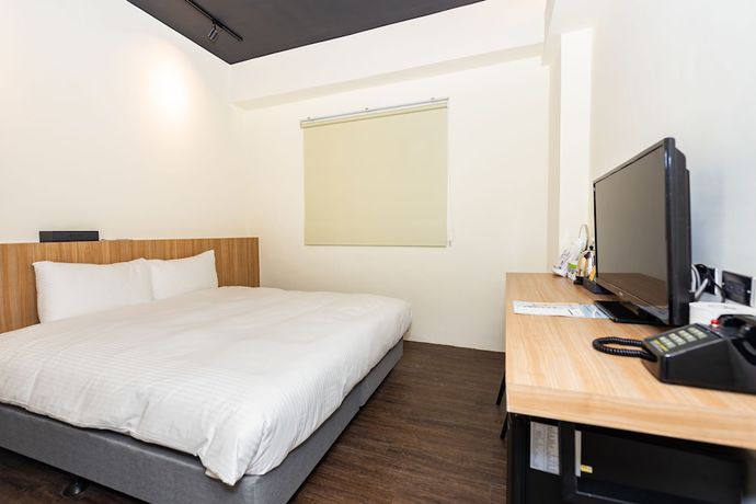 Imagen de la habitación del Hotel Traveller-inn Teihua Ii. Foto 12