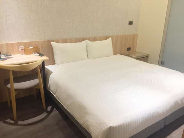 Imagen de la habitación del Hotel Traveller-inn Zhongzheng Library. Foto 11