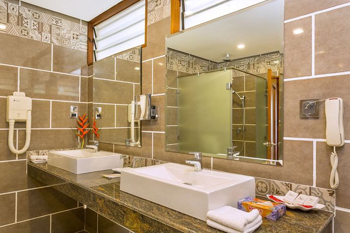Imagen de la habitación del Hotel Travellers Beach And Club. Foto 8