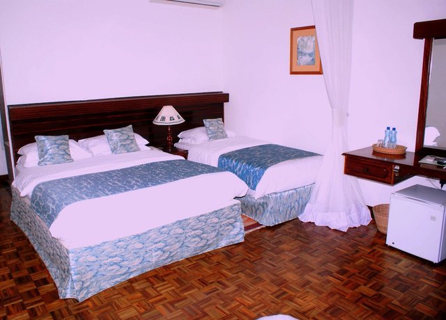 Imagen de la habitación del Hotel Travellers Beach And Club. Foto 10