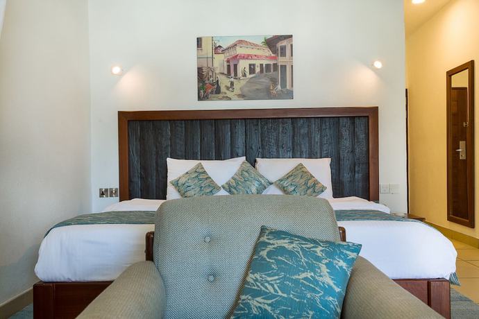 Imagen de la habitación del Hotel Travellers Beach And Club. Foto 14