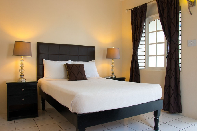 Imagen de la habitación del Hotel Travellers Beach Resort. Foto 4