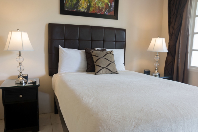 Imagen de la habitación del Hotel Travellers Beach Resort. Foto 5