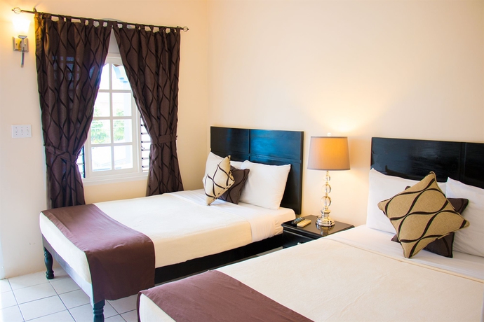 Imagen de la habitación del Hotel Travellers Beach Resort. Foto 6