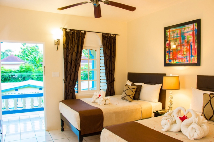 Imagen de la habitación del Hotel Travellers Beach Resort. Foto 8