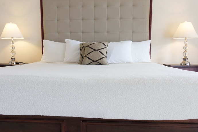 Imagen de la habitación del Hotel Travellers Beach Resort. Foto 11