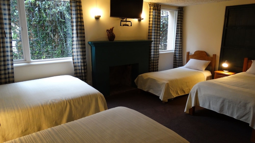 Imagen de la habitación del Hotel Travellers Inn, Quito. Foto 13