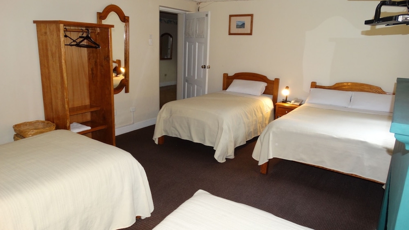 Imagen de la habitación del Hotel Travellers Inn, Quito. Foto 14