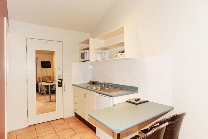 Imagen de la habitación del Hotel Travellers Motor Village. Foto 3