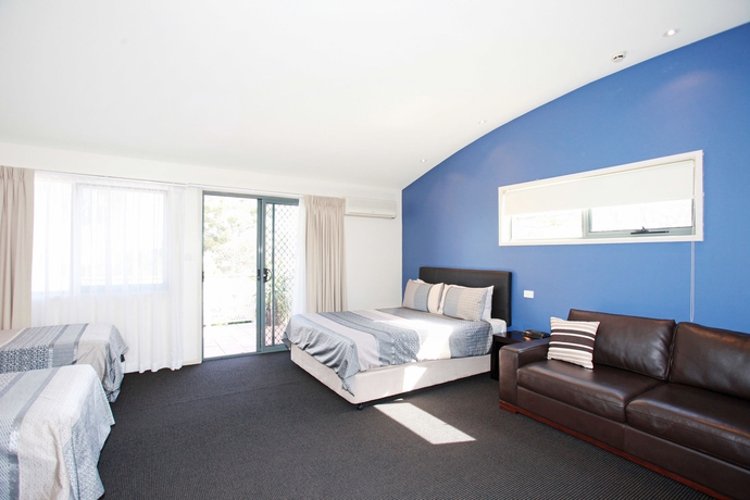 Imagen de la habitación del Hotel Travellers Motor Village. Foto 8