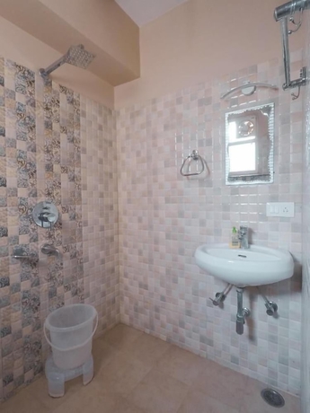 Imagen de la habitación del Hotel Travelling Troopers Homestay. Foto 11