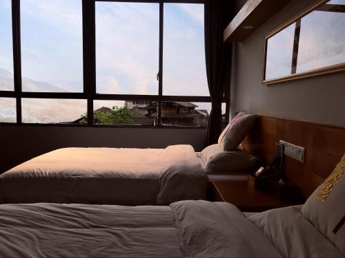 Imagen de la habitación del Hotel Travelling With Long Ji Ping An. Foto 5