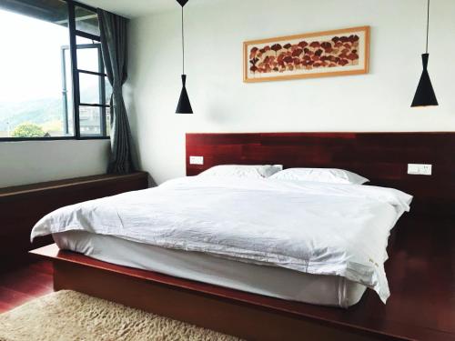 Imagen general del Hotel Travelling With Long Ji Ping An. Foto 4