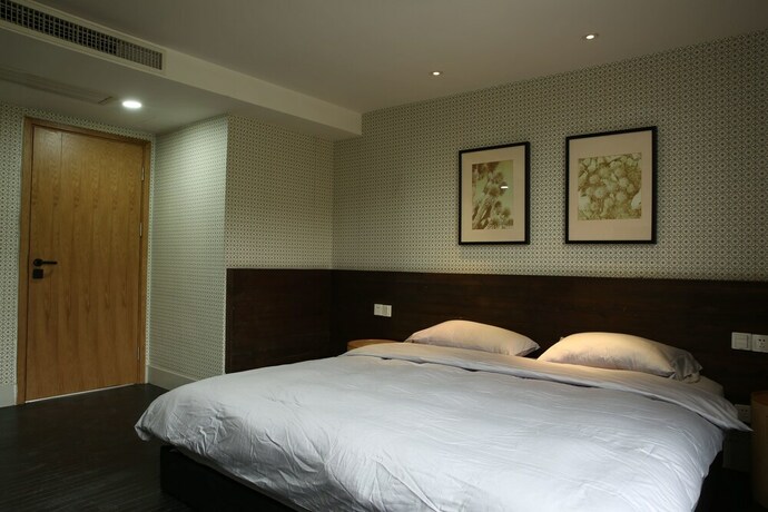 Imagen de la habitación del Hotel Travellingwith X Jnbyhome Hangzhou. Foto 6