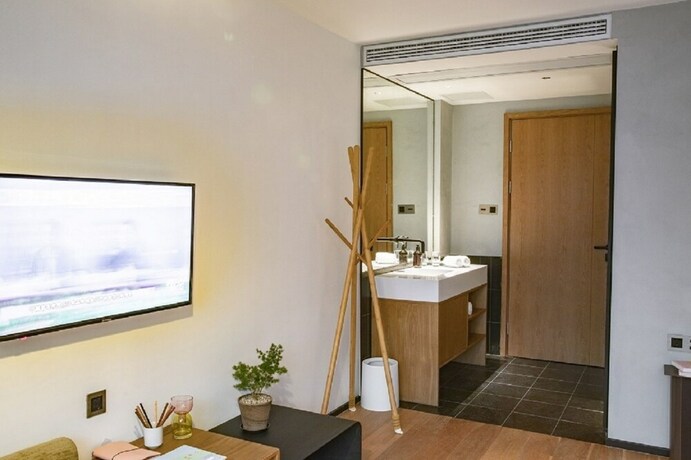 Imagen de la habitación del Hotel Travellingwith X Jnbyhome Hangzhou. Foto 8