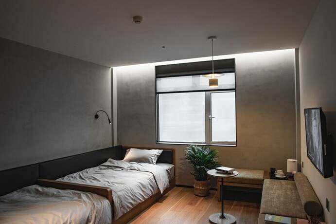 Imagen de la habitación del Hotel Travellingwith X Jnbyhome Hangzhou. Foto 10