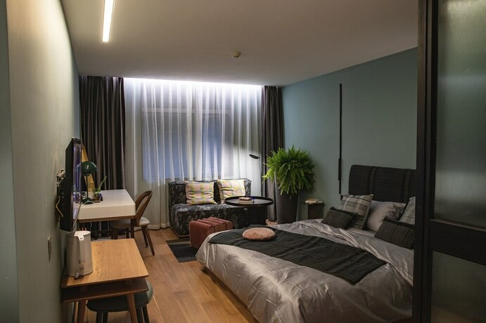 Imagen de la habitación del Hotel Travellingwith X Jnbyhome Hangzhou. Foto 11