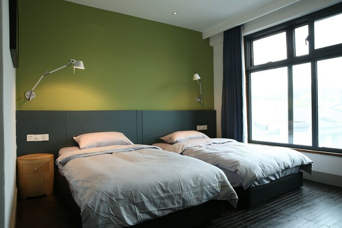 Imagen de la habitación del Hotel Travellingwith X Jnbyhome Hangzhou. Foto 12