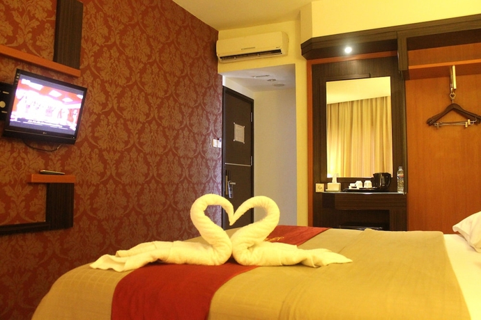 Imagen de la habitación del Hotel Travello Manado. Foto 3