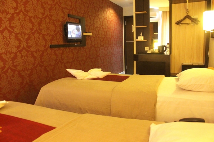 Imagen de la habitación del Hotel Travello Manado. Foto 5