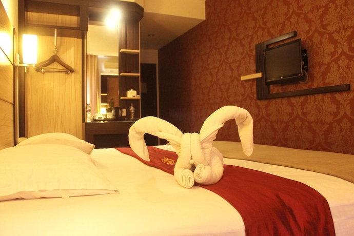 Imagen de la habitación del Hotel Travello Manado. Foto 6