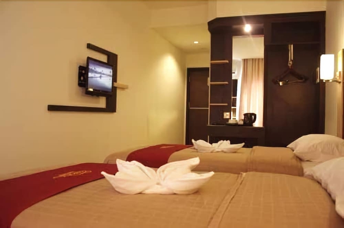 Imagen de la habitación del Hotel Travello Manado. Foto 7