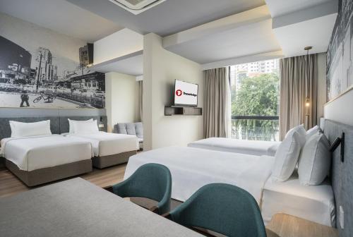 Imagen de la habitación del Hotel Travelodge Bukit Bintang. Foto 2