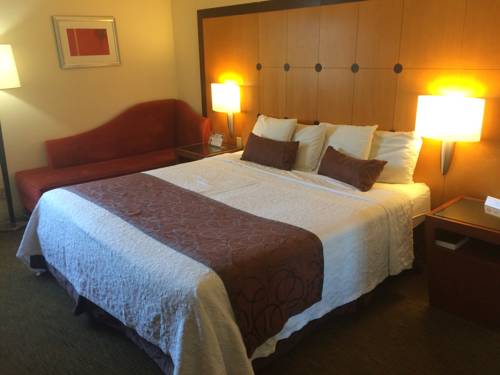 Imagen de la habitación del Hotel Travelodge By Wyndham Brooklyn Center. Foto 5