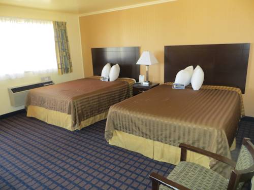 Imagen de la habitación del Hotel Travelodge By Wyndham Dodge City. Foto 12