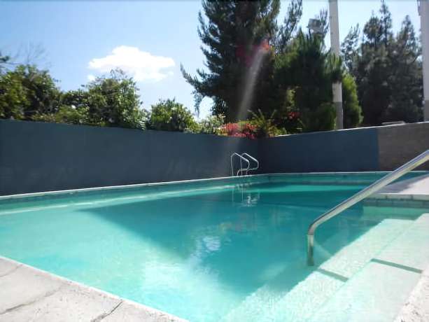 Imagen de la piscina del Hotel Travelodge By Wyndham Fairplex Pomona. Foto 13