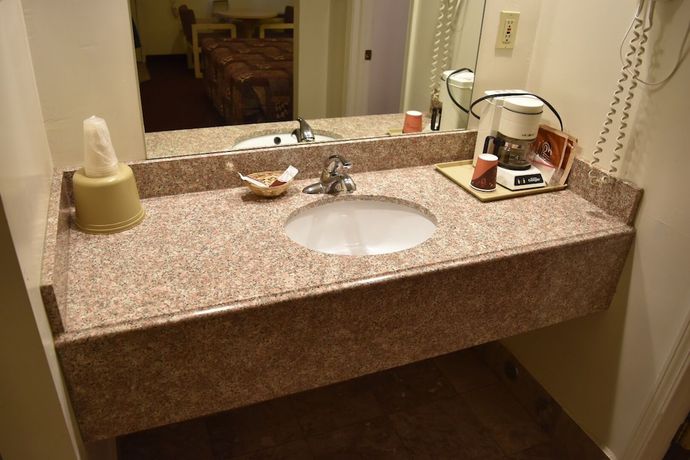 Imagen de la habitación del Hotel Travelodge By Wyndham Farmington. Foto 2